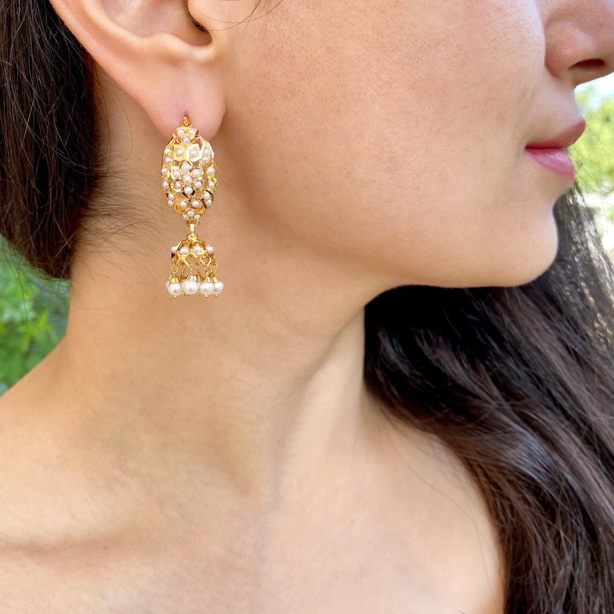 gold jhumka studded with pearls for indian festivals and gatherings