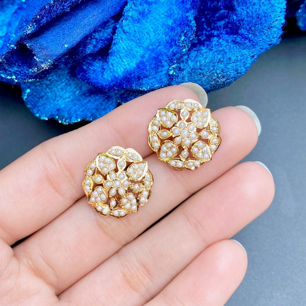 small round gold tops for women on gold and pearls