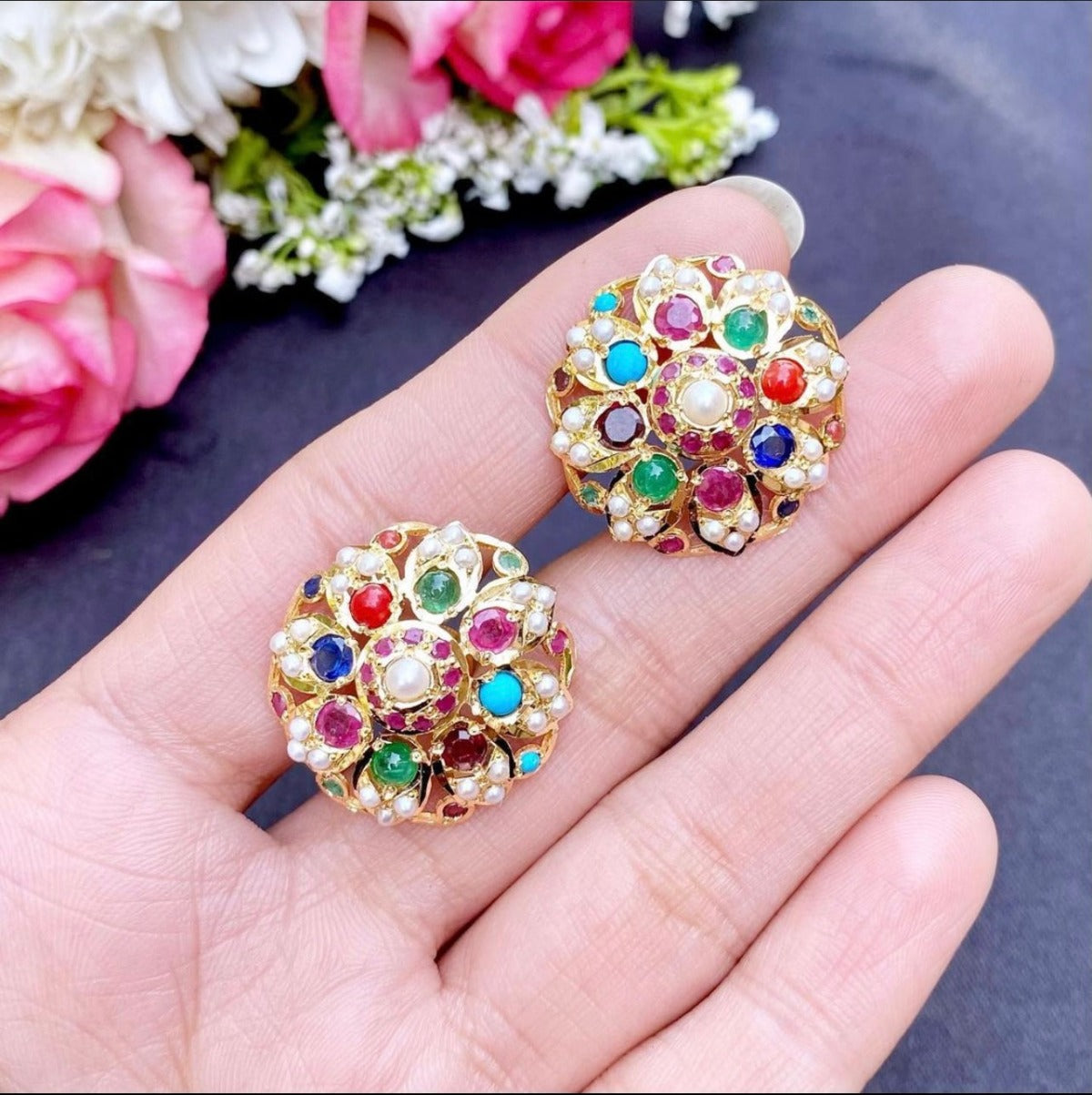 gold stud earrings in navratna stones to pair up with colorful saree