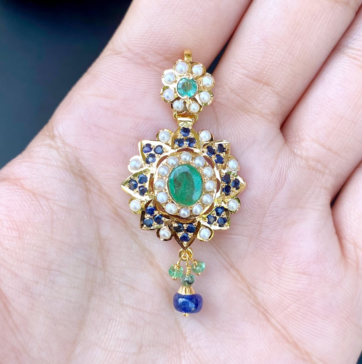 indian gold pendant tanishq with emeralds and sapphires