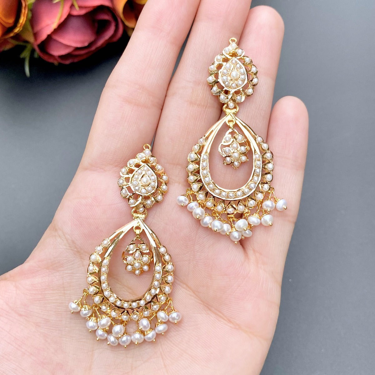 indian pearl chandbali earrings on gold 