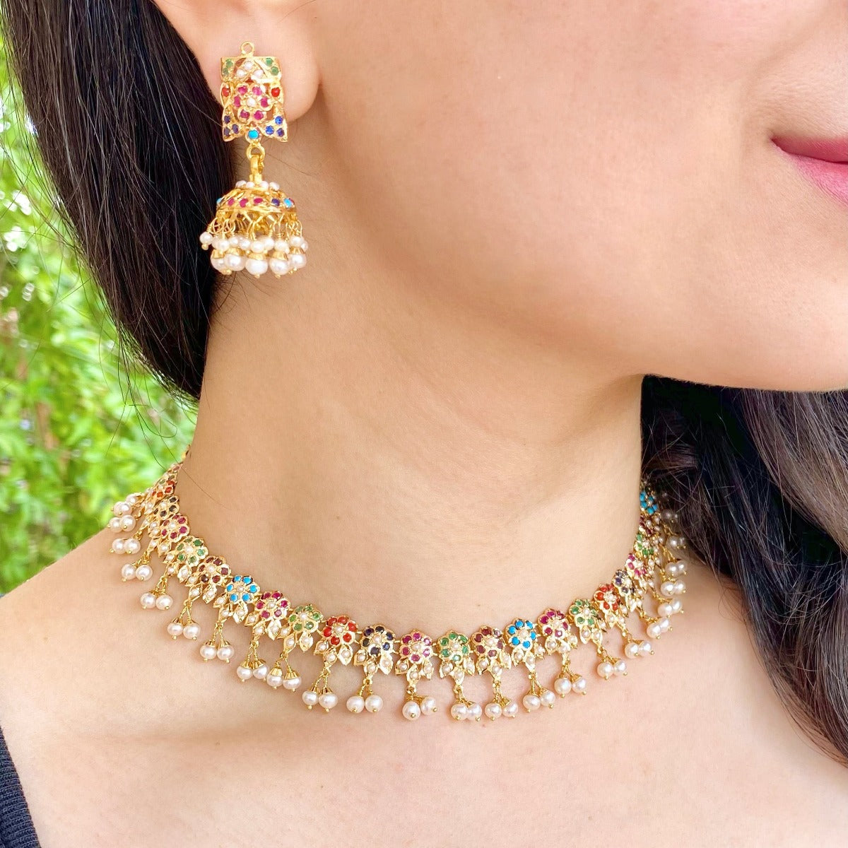 gold jadau necklace and jhumki in navratna