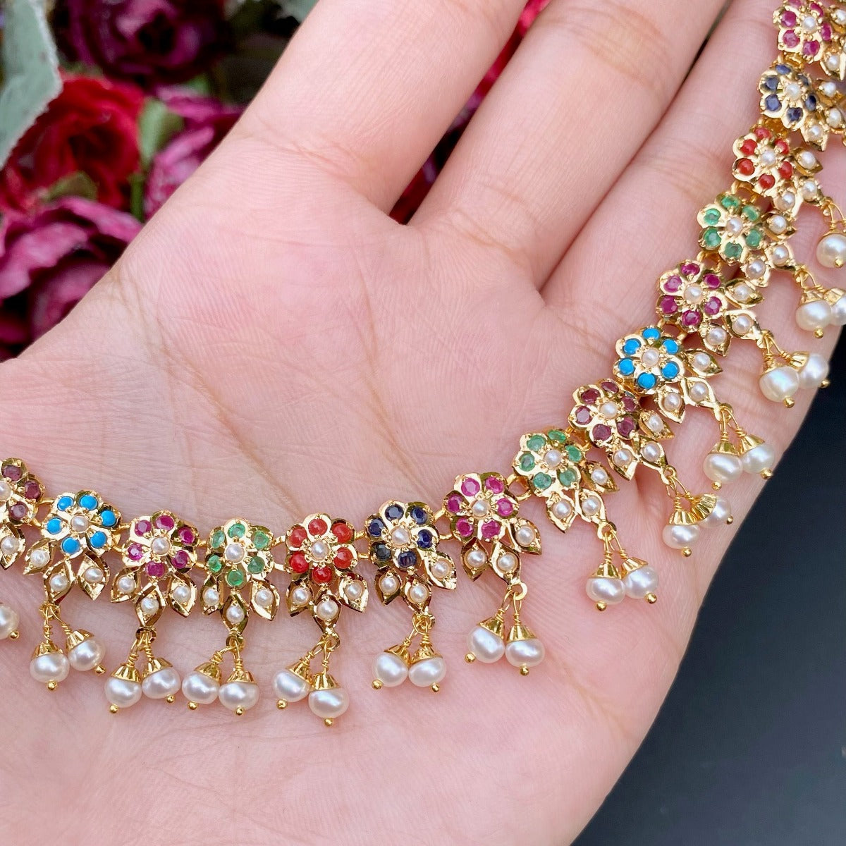 gold necklace set in navratna color stones