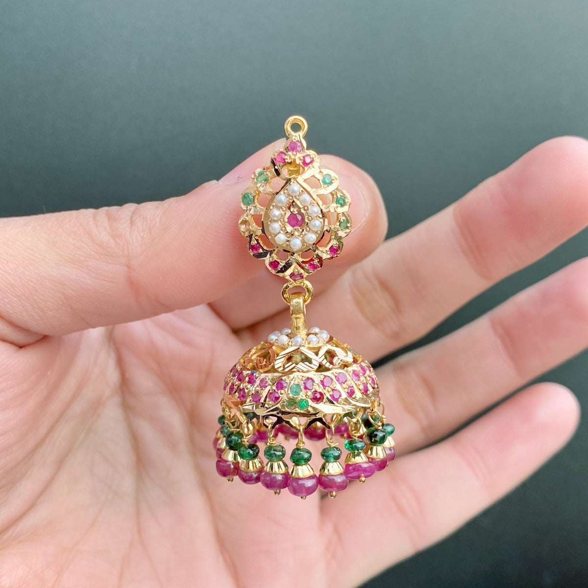 indian gold jhumka studded with ruby emerald and pearls