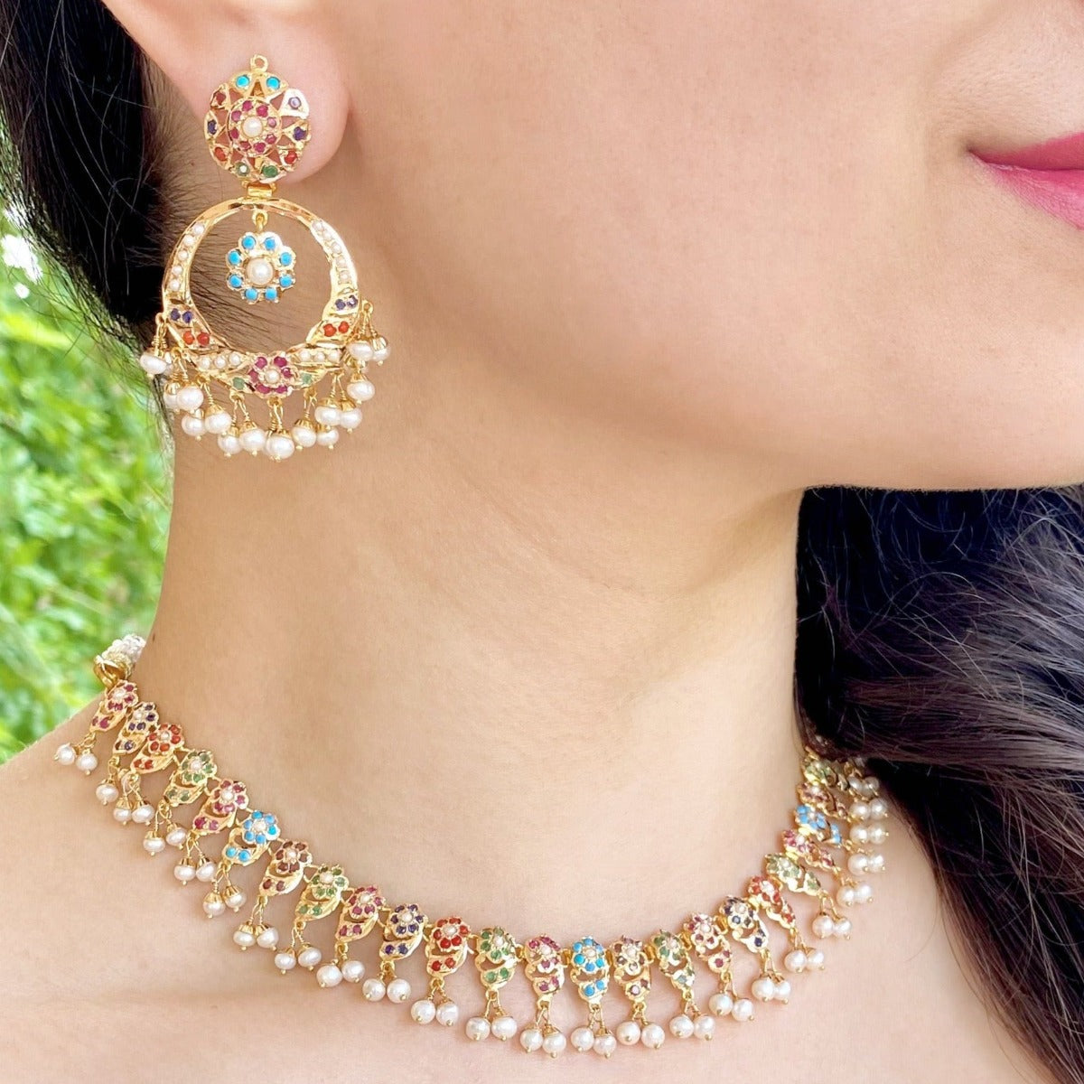 traditional indian / pakistani jadau jewelry on pure gold and studded with navratna stones