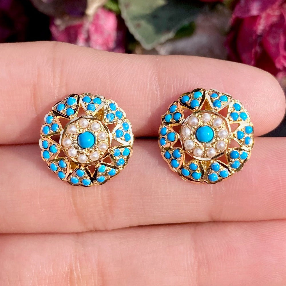 jadau stud earrings studded with pearls and firoza