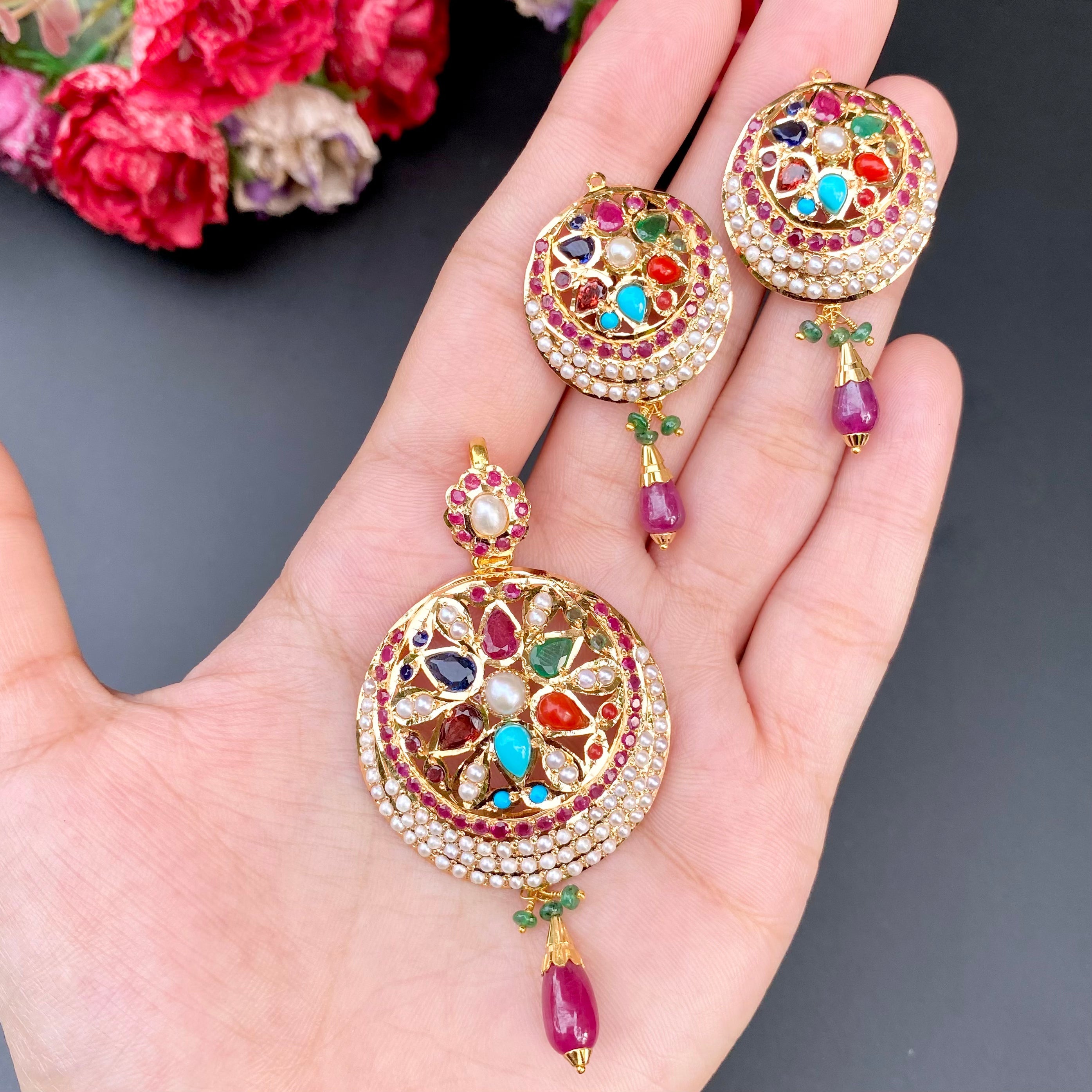 navratna pendant set with prominently visible navratna stones