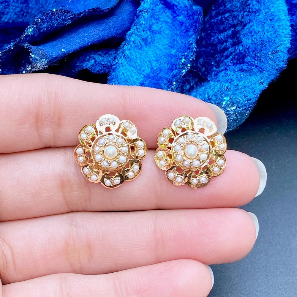 pearls studded round gold stud earrings on gold